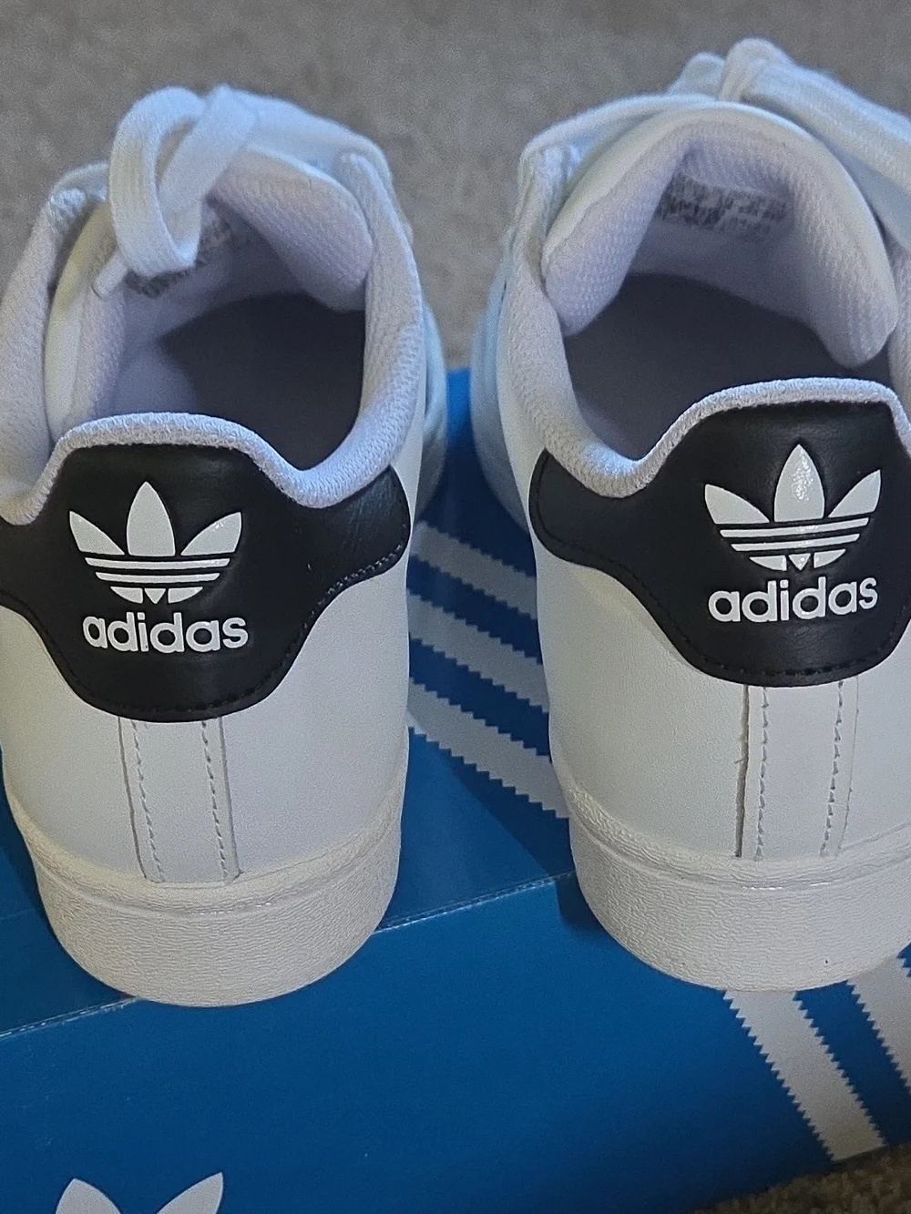 Adidas Superstar White Sneakers with Black Stripes